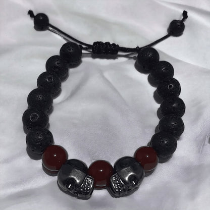 Pulsera Doble Cráneo Piedra Volcánica - Diversa Colección